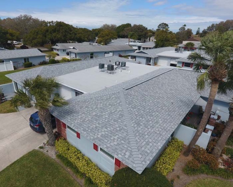 Low-Slope Commercial Roof Service by Storm Peak Roofing